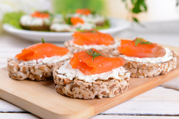 Delicious canapes on table close-up