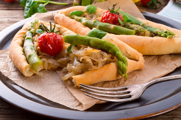 home-baked pide with green asparagi