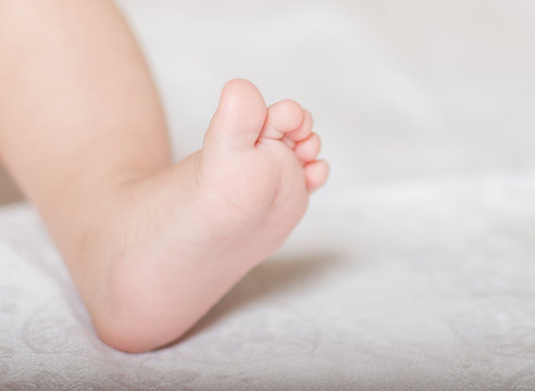 Little baby close-up foot