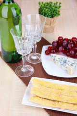 Cheese, grape and bread sticks