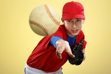 portrait of a beautiful teen baseball player in red and white un - 62774352
