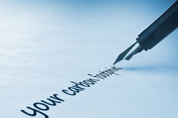Fototapeta premium Fountain pen writing Your carbon footprint