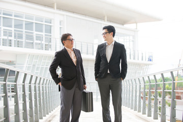 asian business male chatting