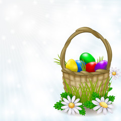 Basket full of easter eggs on a light background