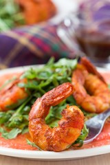 Carpaccio of grapefruit with rucola, arugula salad and spicy
