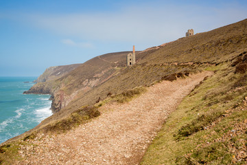 Coast path and Cornish tin mine St Agnes Beacon Cornwall