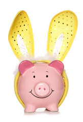 Piggy bank wearing easter bunny ears