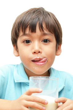 Little boy drinking milk