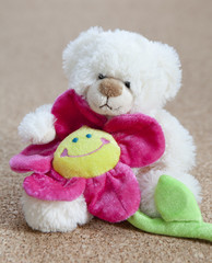 ours et fleur colorée