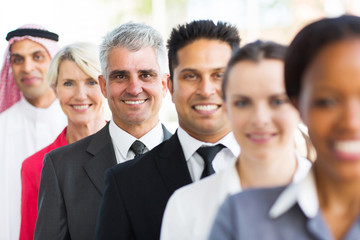 Fototapeta premium senior businessman standing in a row