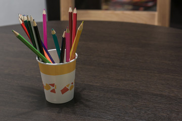 Obraz premium Glass with pencils