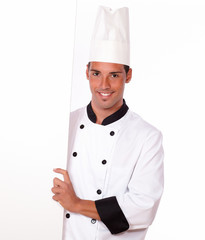 Professional chef holding a blank placard