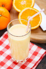 Glass of orange smoothie