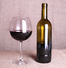 Wine bottle and glass