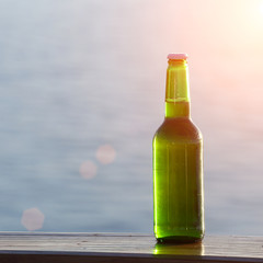 Bottle of beer on the beach