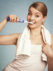 Girl brushing teeth. Dental care healthy teeth.