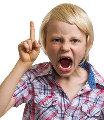 Angry shouting boy with finger raised on white