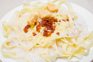 spaghetti carbonara with bacon and cheese