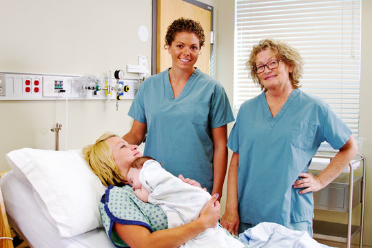 obstetric nurses with Mom and newborn