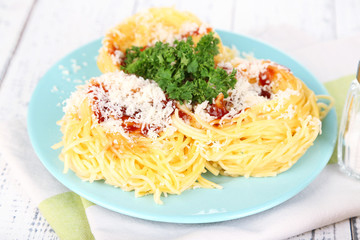 Composition with tasty spaghetti, cheese, tomato sauce