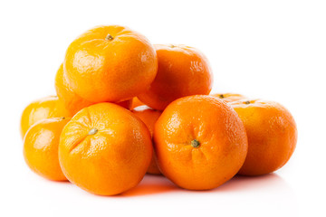 ripe juicy tangerine on a white background.  Clementine Mandarin