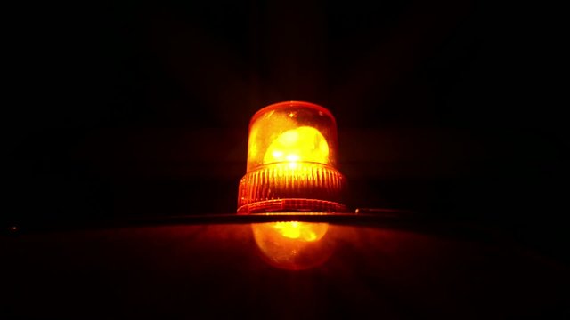 Flashing beacon. Orange flashing and rotating light