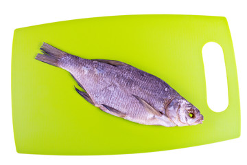 Fototapeta premium Cutting board in the kitchen and the dried bream