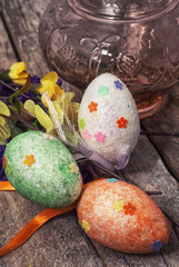 Easter composition with decorative eggs and flowers