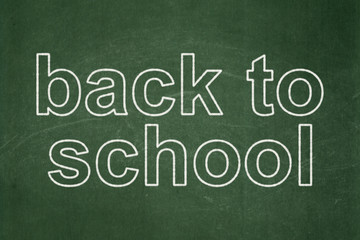 Fototapeta na wymiar Education concept: Back to School on chalkboard background