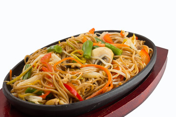 Thai noodles with vegetables isolated on white background