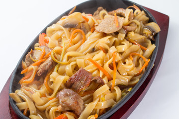 spicy thai noodles isolated on white background