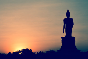 silhouette of Buddha statue