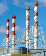 Power station buildings with high industrial pipes  vertical