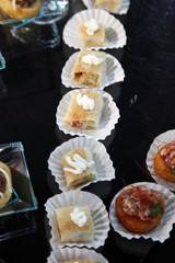 Colorful desserts and pastry served on a wedding party