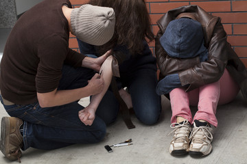 Three junkies mainlining