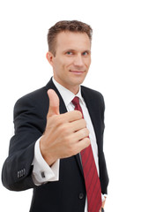 Young happy business man showing thumb's up sign
