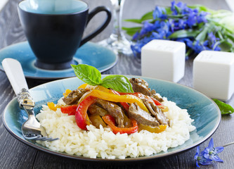 Beef with peppers and rice the Asian way.