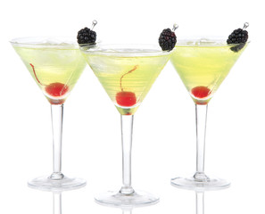 Three yellow cocktail drinks mai tai or tropical Martini with ch