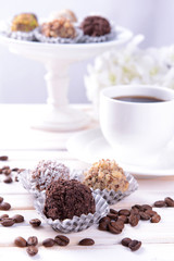 Set of chocolate candies on table on light background
