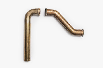 Copper Plumbing Pipe Sections. Two pieces of copper pipe.  Shiny formed shaped pieces.