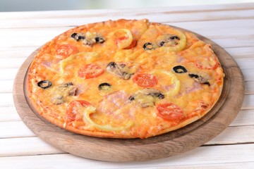 Tasty pizza on table close-up