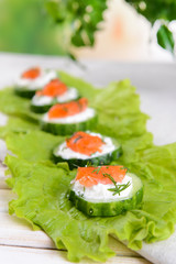 Delicious canapes on table close-up