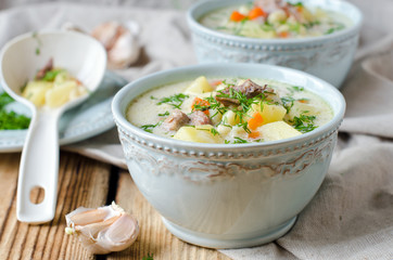 Cheese soup with chicken and vegetables