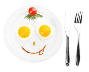 Scrambled eggs with bread on plate, on color napkin