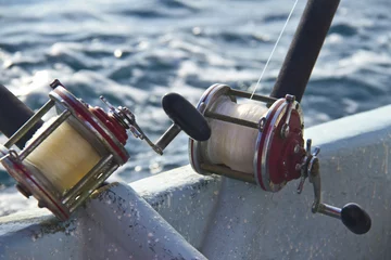 Fotobehang heavy fishing reels on the shipboard © monstersparrow