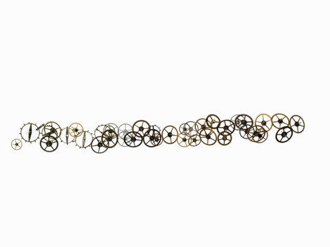 Watch gears, small precision made cog wheels with spokes and fine teeth or notches around the edge. Arranged in a irregular line.