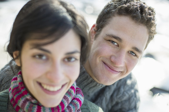 Close up of two people, man and woman, a couple outdoors on a winter day. 