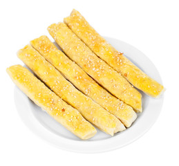 Tasty bread sticks isolated on white
