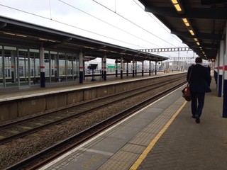 Londoner Commuter walking on a train platform