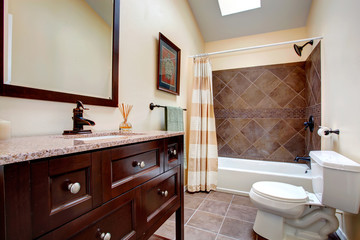 Fototapeta na wymiar Elegant bathroom with tile wall trim